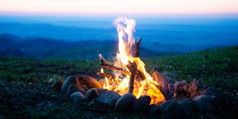 How do I build and maintain a campfire?